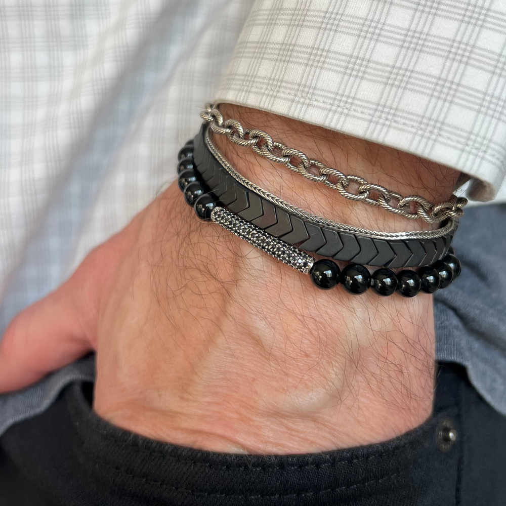 Joyful and Co handcrafted men's jewelry collection featuring gemstone bracelets chain necklaces and rings.