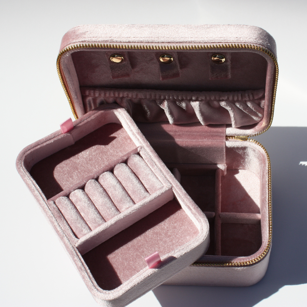 Joyful and Co compact travel jewelry box organizer for protecting gold necklaces rings and earrings.