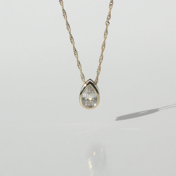 14K Gold Pear Diamond Necklace - Bezel Certified Solitaire on Singapore Chain