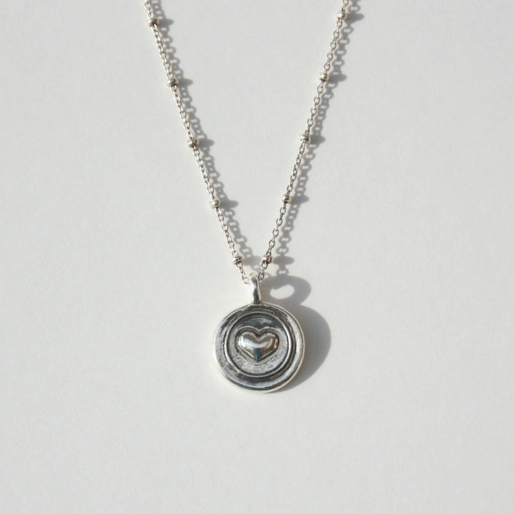 Center 3D Heart Coin Necklace