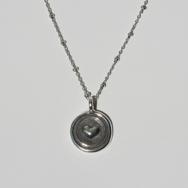 Center 3D Heart Coin Necklace