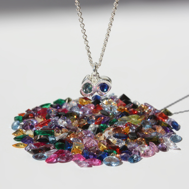 "Joyful and Co .999 fine silver sand cast double pear cut gemstone pendant necklace on a sterling silver curb chain."