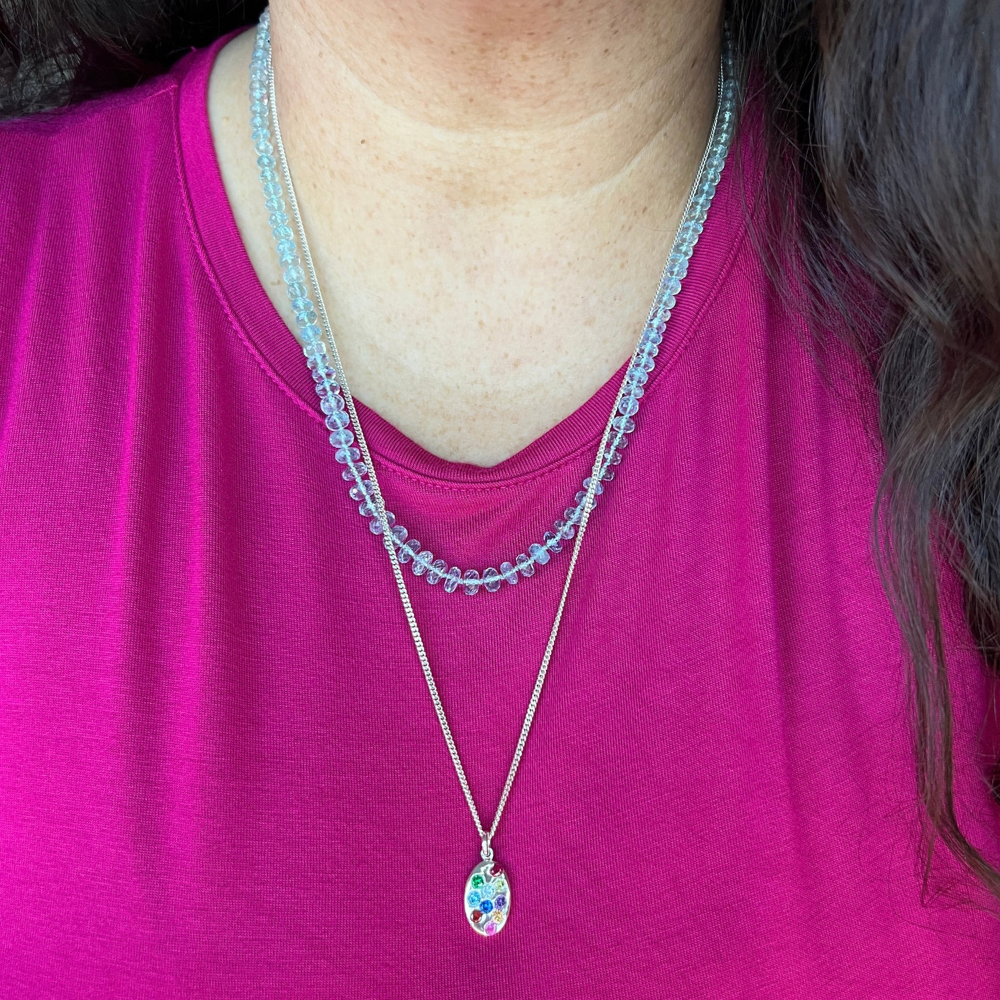 Mode Wearing Multi Gemstone Fine silver oval coin pendant and aquamarine gemstone beaded necklace. 