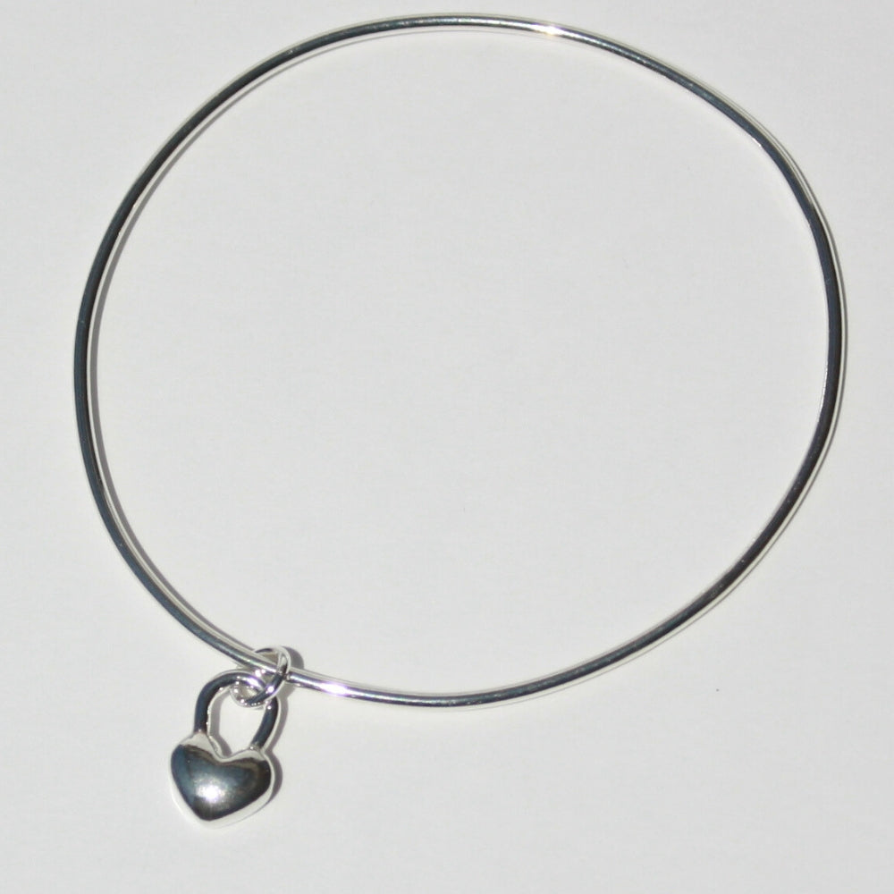 Joyful and Co handcrafted sterling silver heart charm bangle bracelet with pure fine silver metal clay charm.